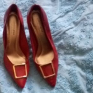 Red buckled heals